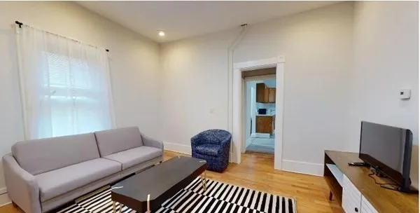 7 bed, 2 bath apartment for rent at 28 Sumner Unit Street, Dorchester — photo 2 of 16