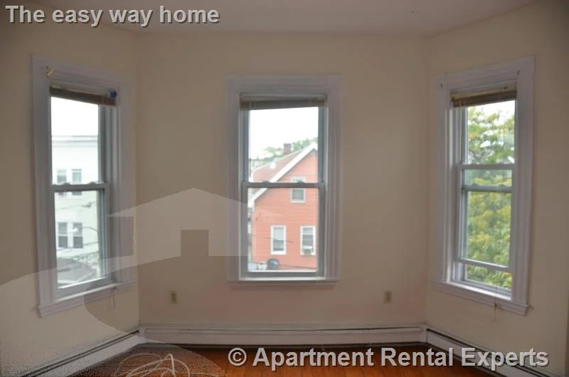 3 bed, 1 bath apartment for rent at 30 Otis St Unit 3, Sullivan Square — photo 4 of 11