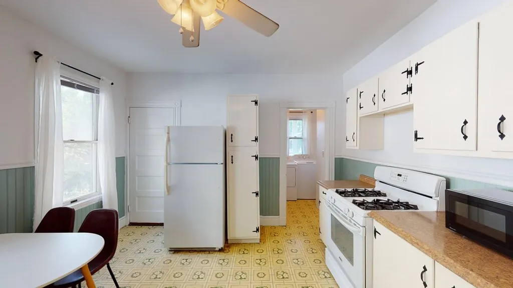 4 bed, 1 bath apartment for rent at 30 Roseclair Unit 2, Boston — photo 3 of 14