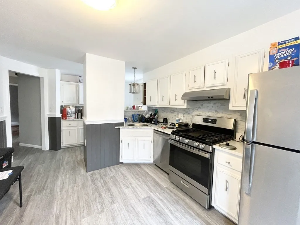 6 bed, 2 bath apartment for rent at 31 Falcon St Unit 2, Boston — photo 2 of 14