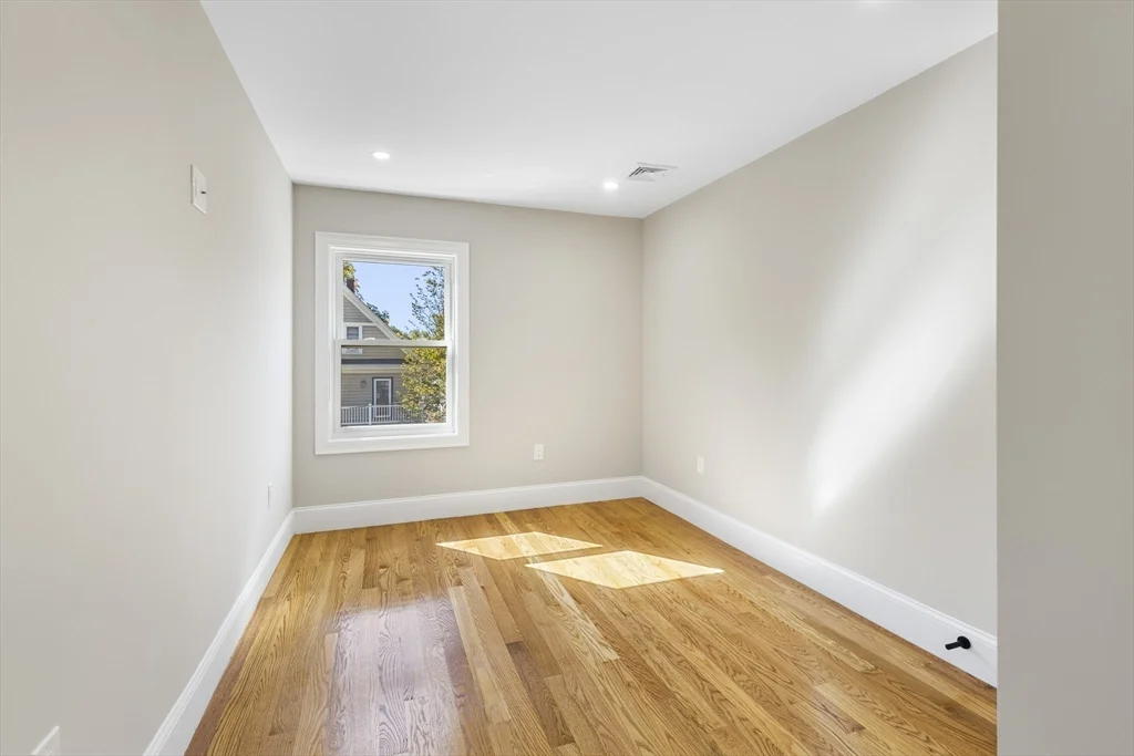 3 bed, 1 bath apartment for rent at 31 Woodale Ave Unit 3, Mattapan — photo 4 of 7