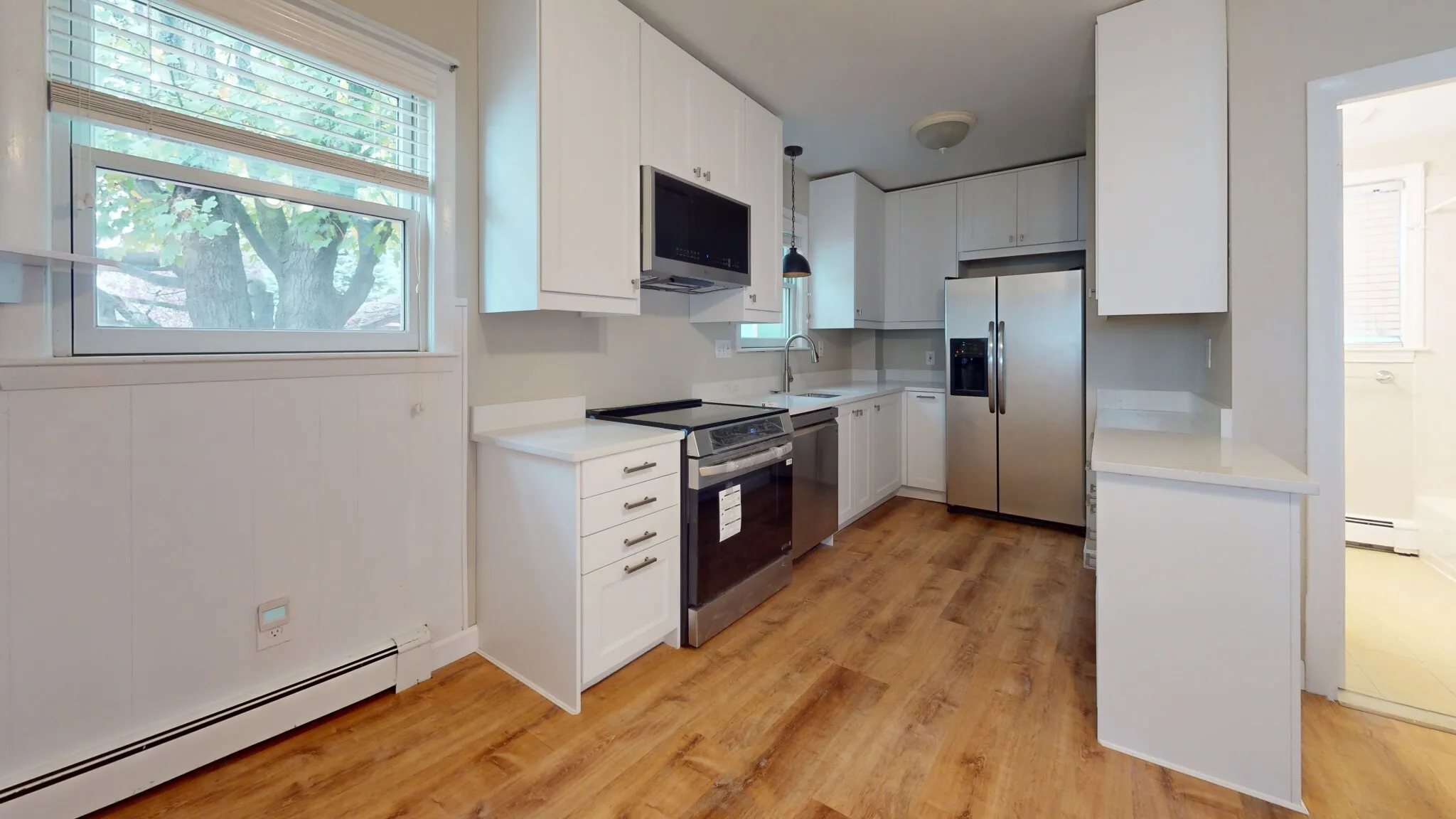 4 bed, 2 bath apartment for rent at 310 Lowell St Unit 1, Magoun Square — photo 1 of 29