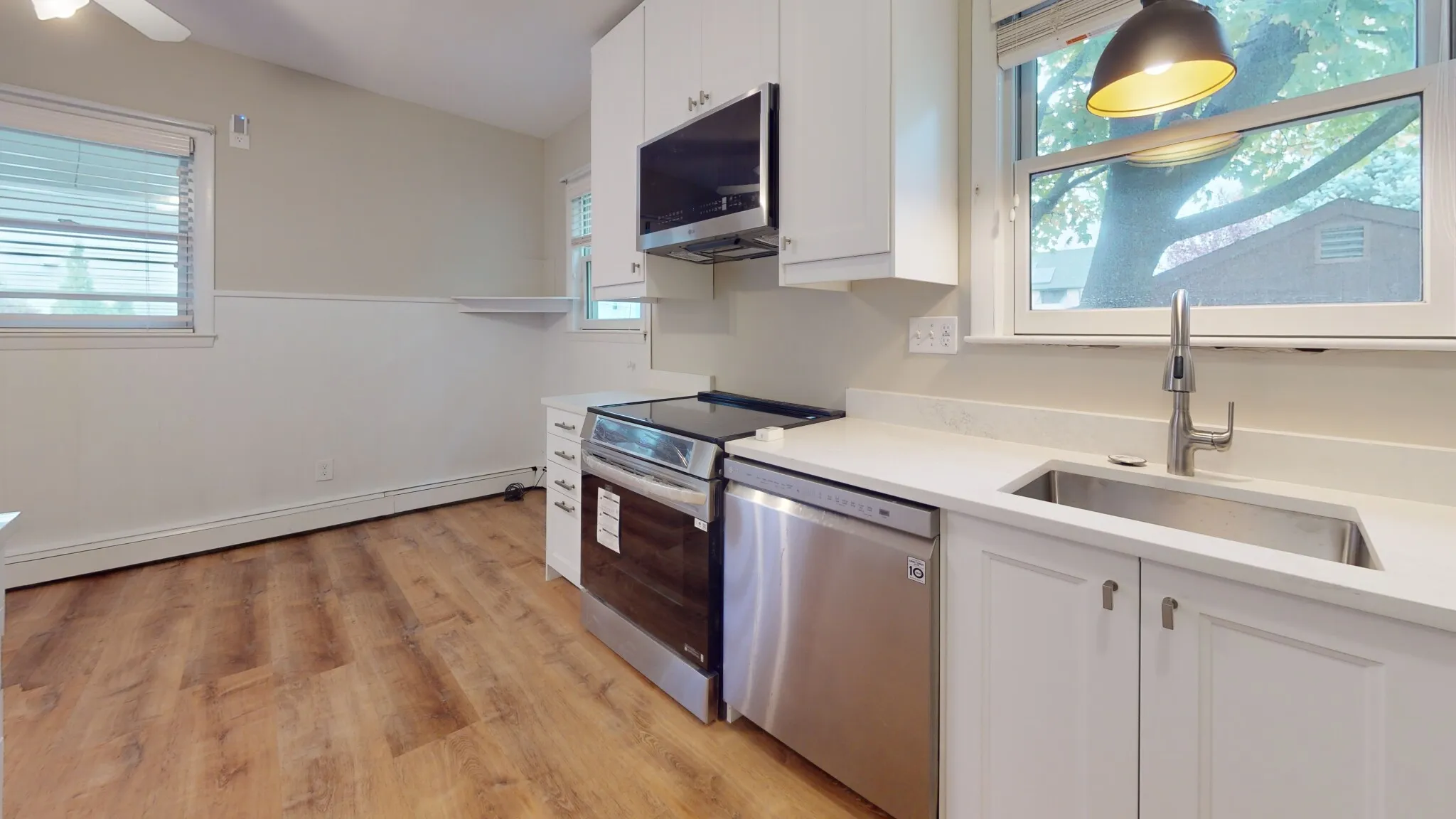 5 bed, 2 bath apartment for rent at 310 Lowell St Unit 310, Magoun Square — photo 2 of 17