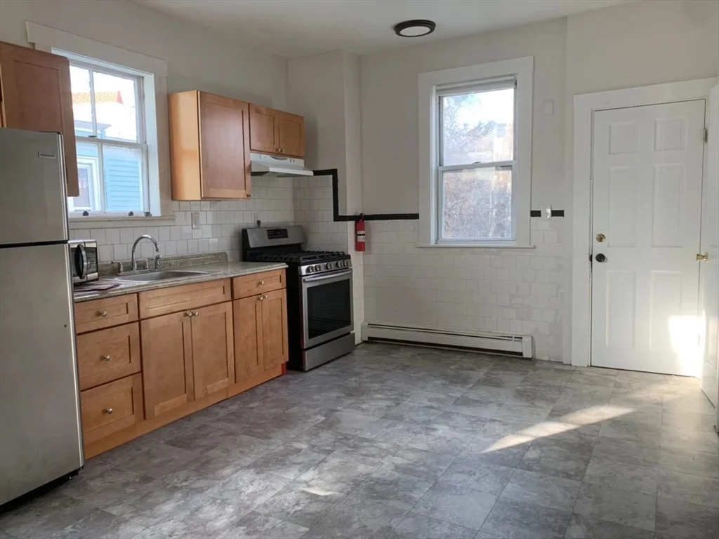 4 bed, 2 bath apartment for rent at 32 E Cottage Unit 2, Dorchester — photo 1 of 12