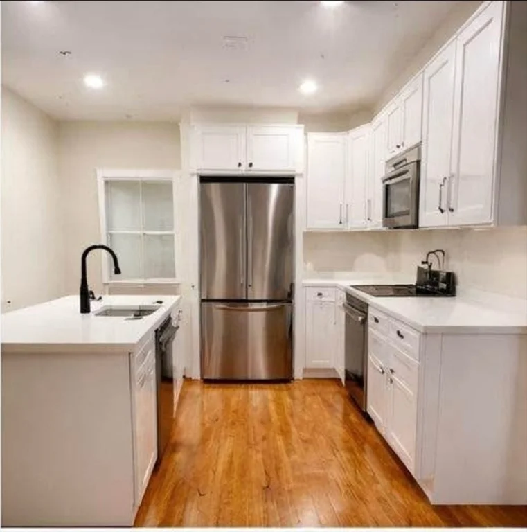4 bed, 1 bath apartment for rent at 32 Westmore Rd Unit 2, Mattapan — photo 5 of 6