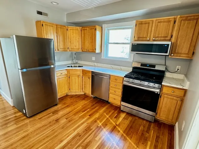 4 bed, 1.5 bath apartment for rent at 33 Adamson St Unit 2, Allston — photo 4 of 17
