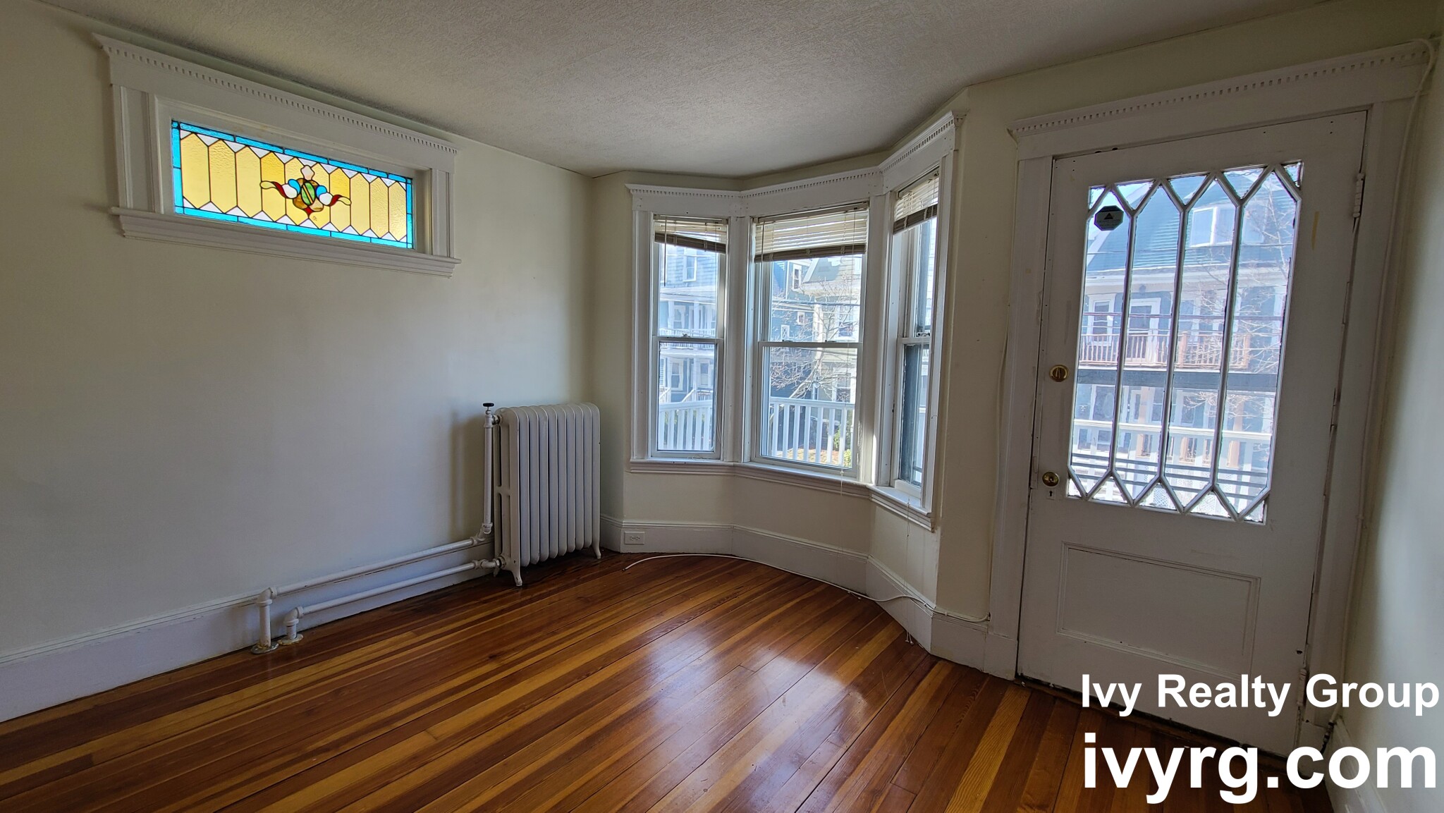 4 bed, 1.5 bath apartment for rent at 34 Bay State Ave Unit 2, Powder House Square — photo 4 of 13