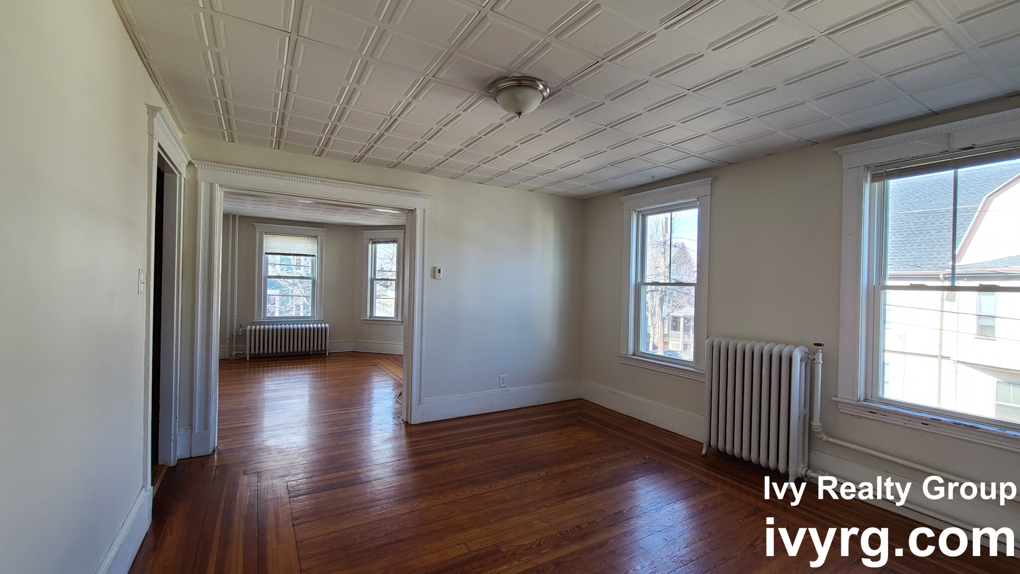 4 bed, 1.5 bath apartment for rent at 34 Bay State Ave Unit 2, Powder House Square — photo 2 of 13