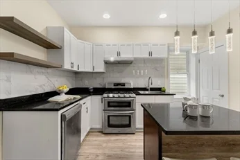 3 bed, 1 bath apartment for rent at 3417 Washington St Unit 2, Jamaica Plain — photo 5 of 12