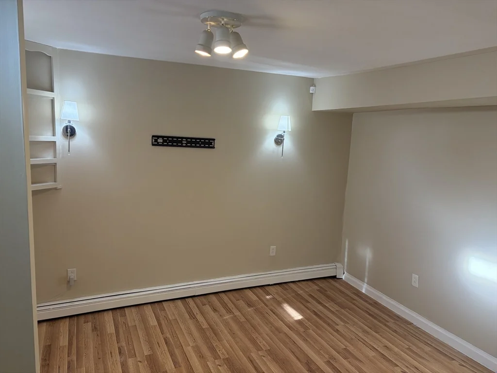 4 bed, 1 bath apartment for rent at 36 Cork Unit 36, Lowell — photo 2 of 20