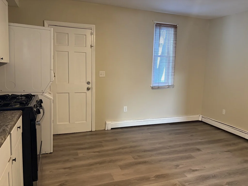 4 bed, 1 bath apartment for rent at 36 Cork Unit 36, Lowell — photo 6 of 20