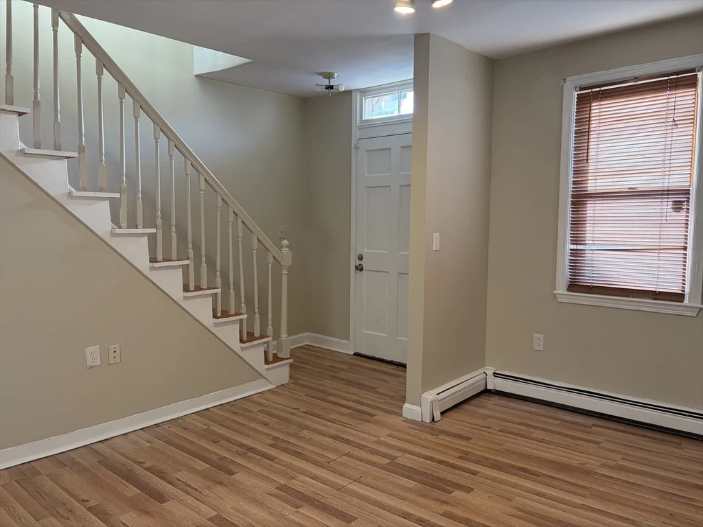 4 bed, 1 bath apartment for rent at 36 Cork Unit 36, Lowell — photo 3 of 20