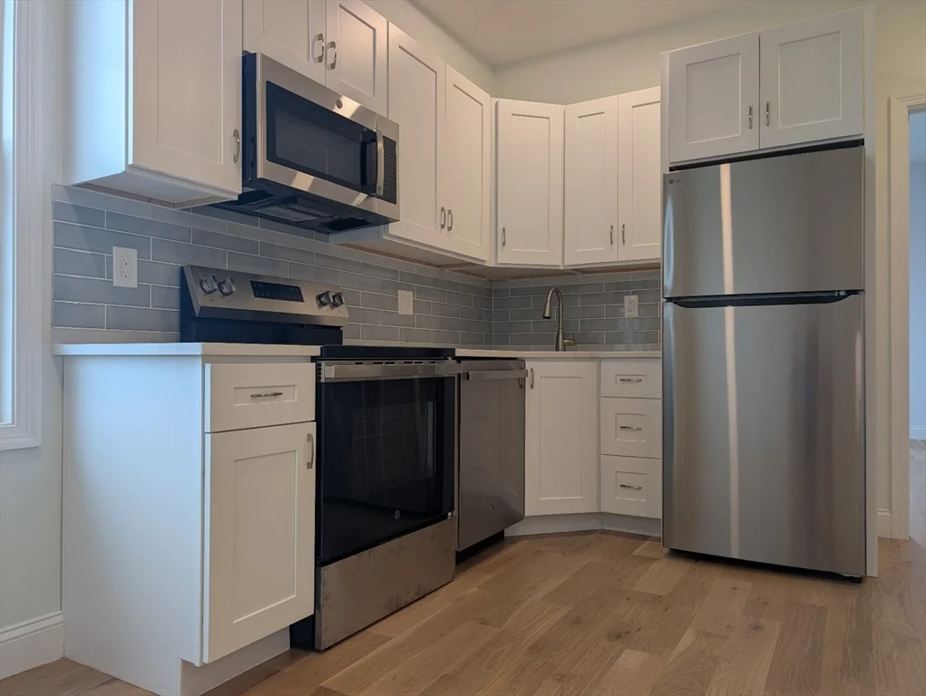 4 bed, 2 bath apartment for rent at 36 Regent St Unit 1, Roxbury — photo 1 of 12