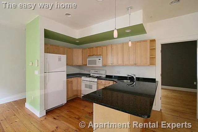 3 bed, 2 bath apartment for rent at 365 Columbia Unit 2, Wellington-Harrington — photo 4 of 14
