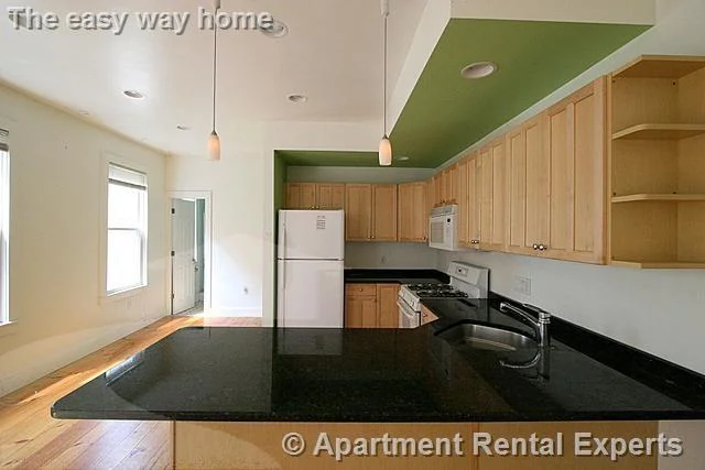3 bed, 2 bath apartment for rent at 365 Columbia Unit 2, Wellington-Harrington — photo 1 of 14