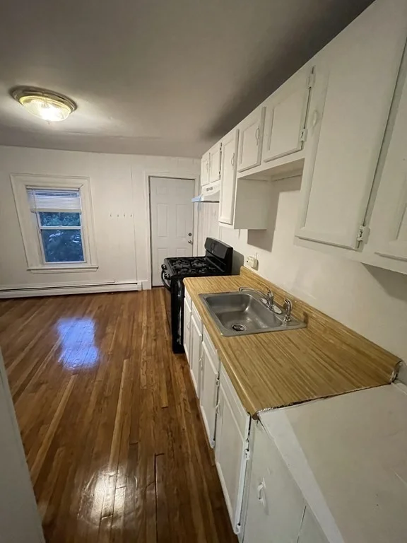 4 bed, 2 bath apartment for rent at 369 Prospect St Unit 2, Wellington-Harrington — photo 1 of 16