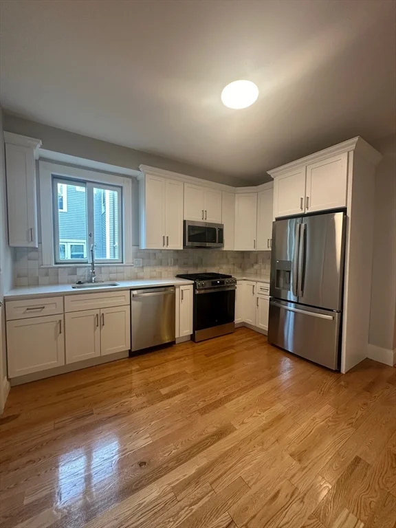 4 bed, 2 bath apartment for rent at 37 Crescent Ave Unit 1, Dorchester — photo 3 of 12
