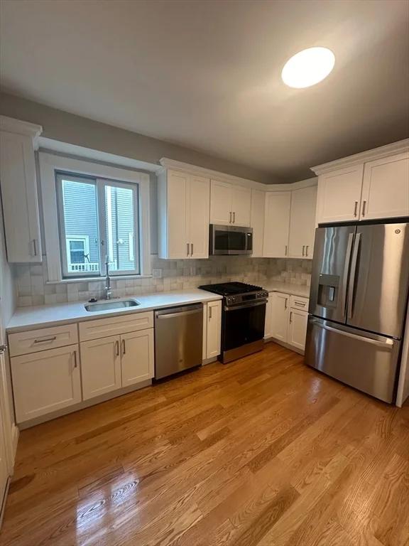 4 bed, 2 bath apartment for rent at 37 Crescent Ave Unit 1, Dorchester — photo 2 of 12