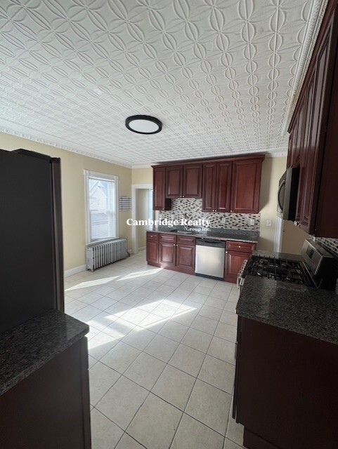 5 bed, 2 bath apartment for rent at 39 Watts St Unit 2, Malden — photo 1 of 16