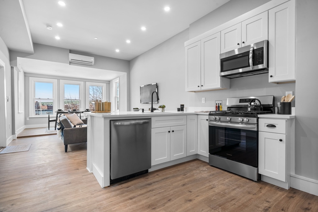 2 bed, 1.5 bath apartment for rent at 390 Meridian St Unit 1, Central Square — photo 1 of 23