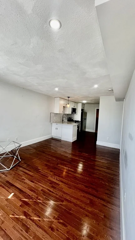 4 bed, 1 bath apartment for rent at 397 Chelsea St Unit 2, East Boston — photo 2 of 10