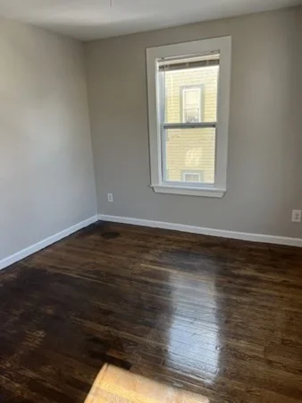 4 bed, 1 bath apartment for rent at 40 Ripley Rd Unit 2, Boston — photo 2 of 7