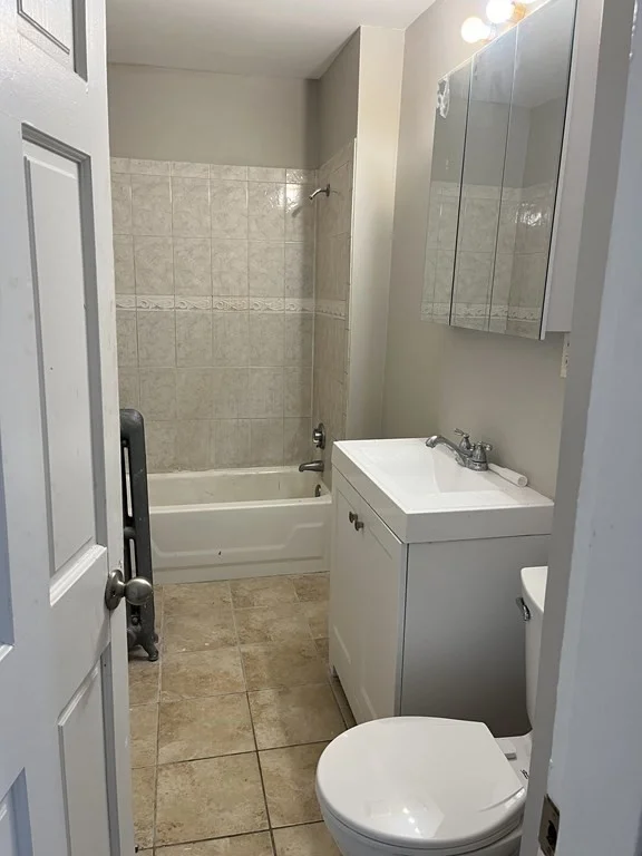 4 bed, 1 bath apartment for rent at 40 Ripley Rd Unit 2, Boston — photo 3 of 7
