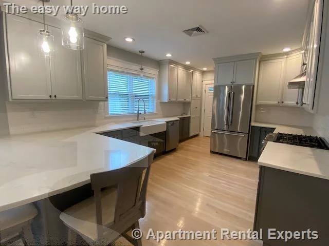 4 bed, 2 bath apartment for rent at 41-43 Garrison Ave Unit 2, Teele Square — photo 1 of 39