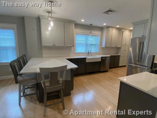 4 bed, 2 bath apartment for rent at 41-43 Garrison Ave Unit 2, Teele Square — photo 2 of 39