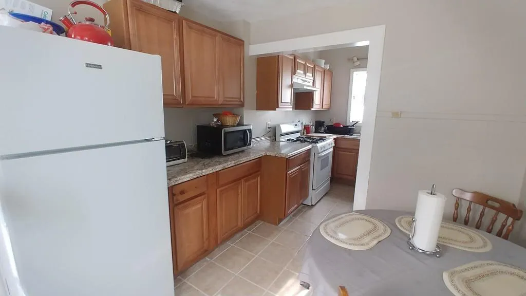 4 bed, 2 bath apartment for rent at 41 Trull St Unit 2, Magoun Square — photo 1 of 11