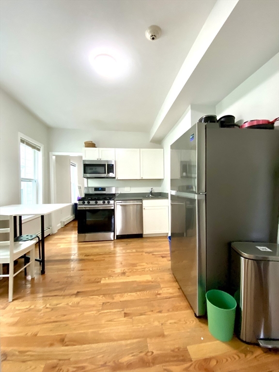 3 bed, 1 bath apartment for rent at 417 Cardinal Medeiros Ave Unit 5, Wellington-Harrington — photo 1 of 13