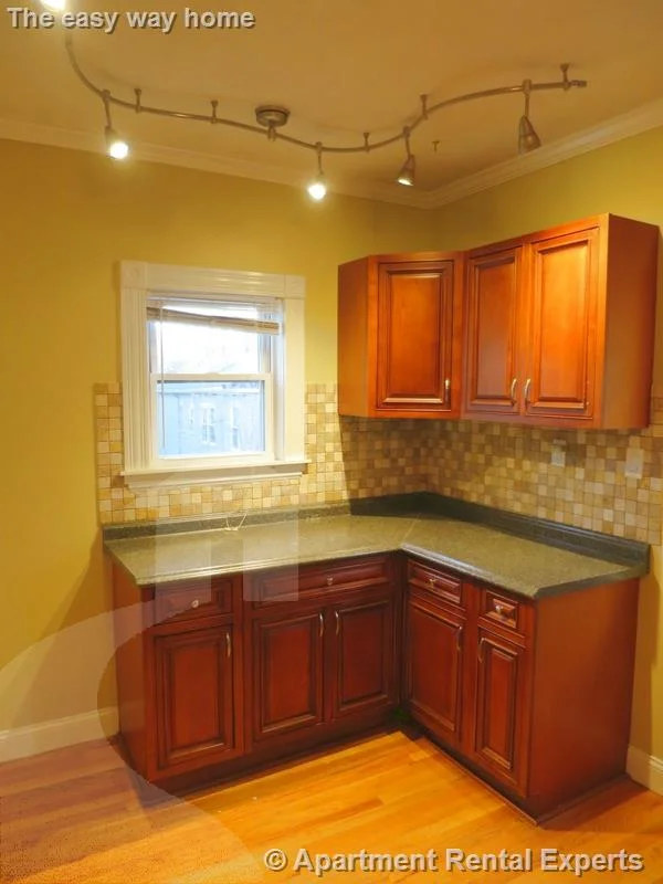 4 bed, 1 bath apartment for rent at 47 Paulina St Unit 2, Davis Square — photo 6 of 21