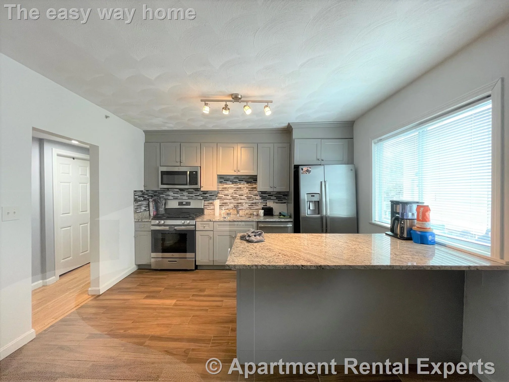 4 bed, 2 bath apartment for rent at 48 Derby St Unit 1, Winter Hill — photo 1 of 10