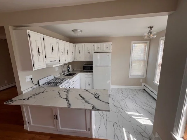 3 bed, 2 bath apartment for rent at 48 Spring Unit 2, Malden — photo 1 of 35