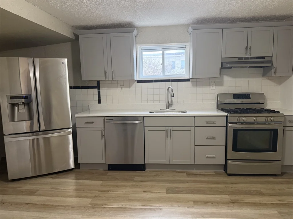 3 bed, 1 bath apartment for rent at 48 Wamesit St Unit 2, Lowell — photo 2 of 14