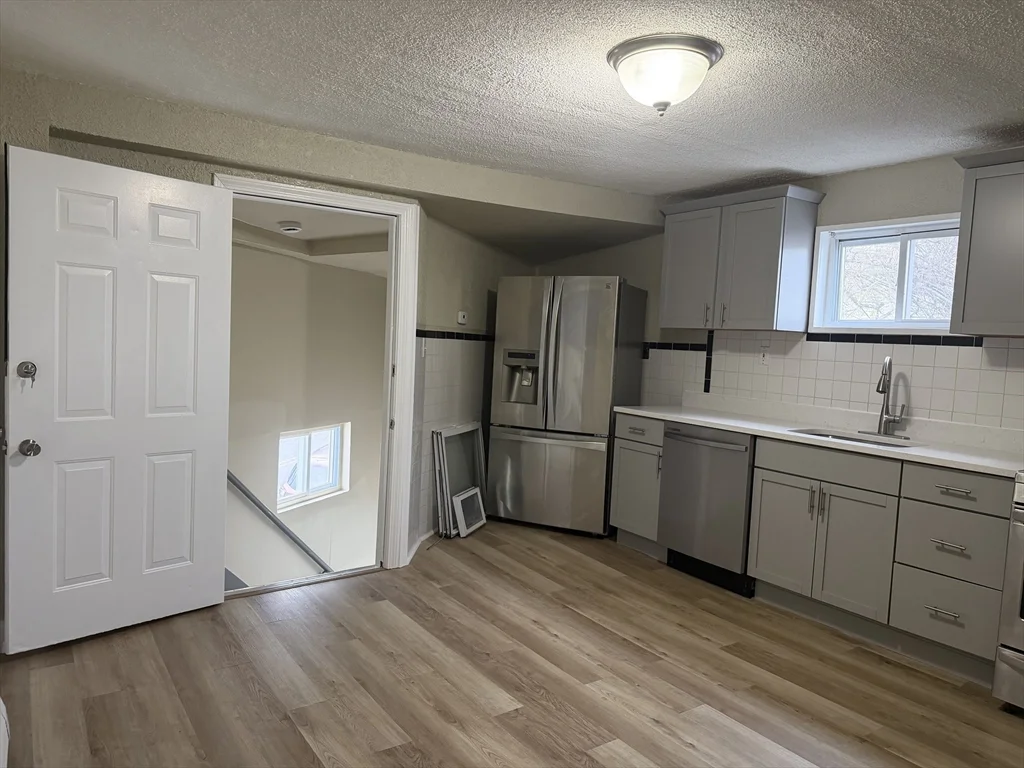 3 bed, 1 bath apartment for rent at 48 Wamesit St Unit 2, Lowell — photo 1 of 14