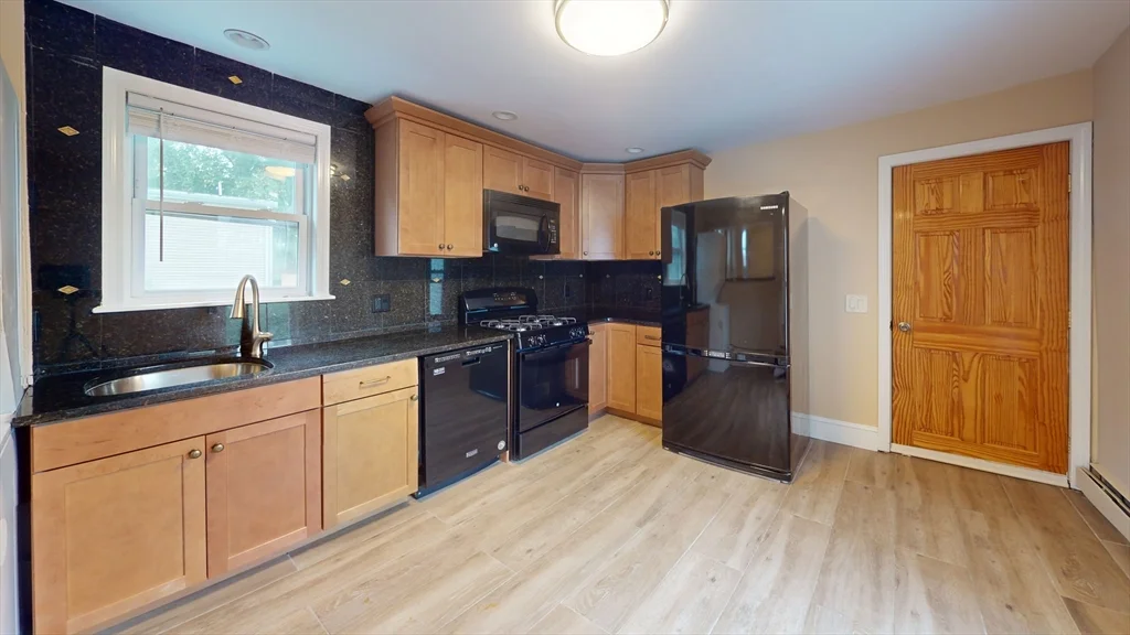 4 bed, 2 bath apartment for rent at 49 Glenwood Unit 2, Magoun Square — photo 1 of 13