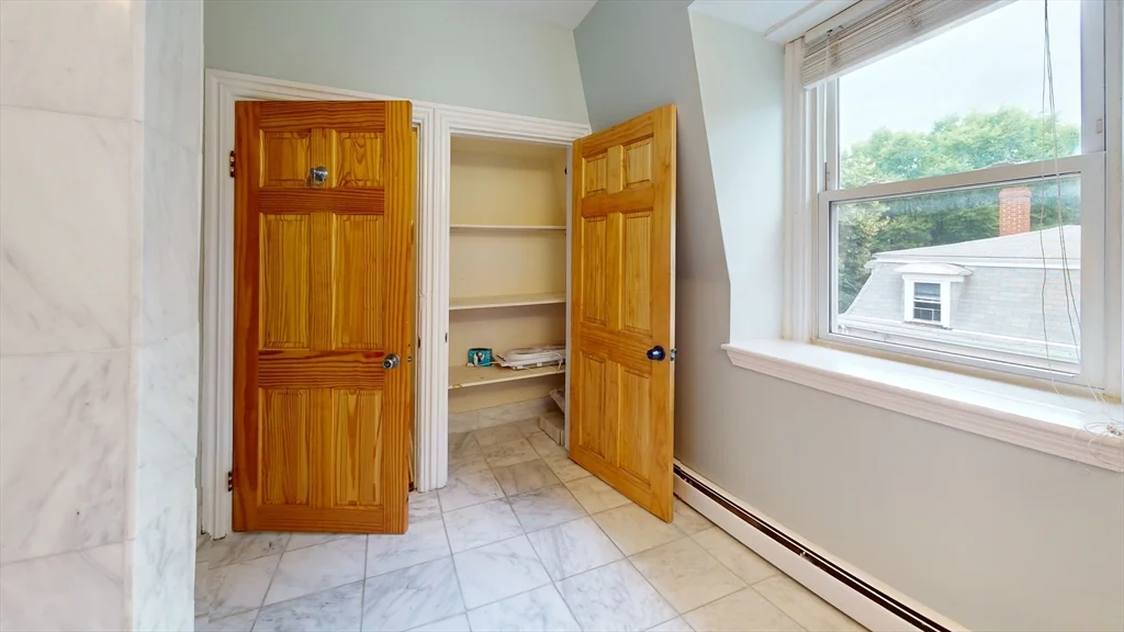 4 bed, 2 bath apartment for rent at 49 Glenwood Unit 2, Magoun Square — photo 5 of 13