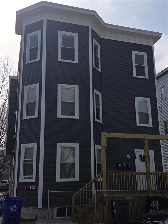 4 bed, 2 bath apartment for rent at 49 Woodcliff St Unit 3, Dorchester — photo 1 of 8