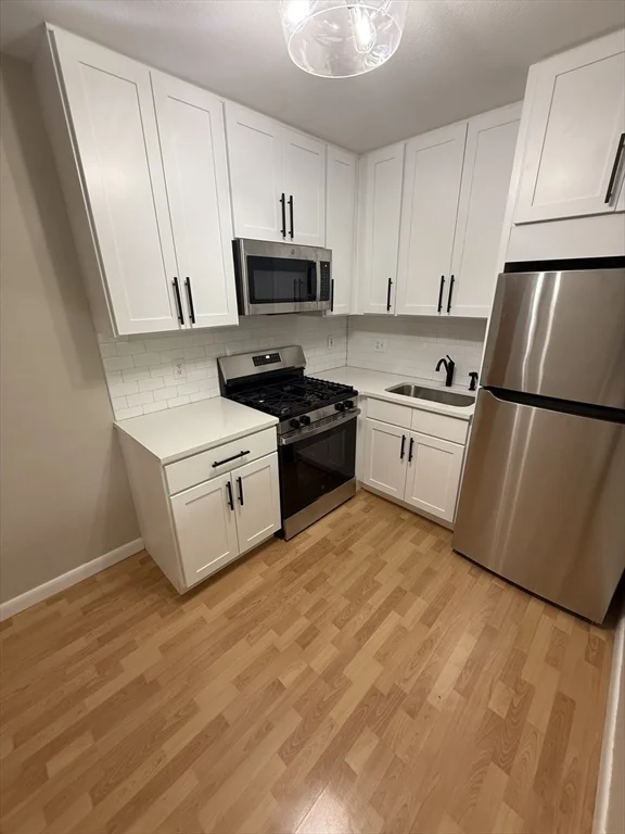 2 bed, 1 bath apartment for rent at 4925 Washington St Unit 410, West Roxbury — photo 3 of 25