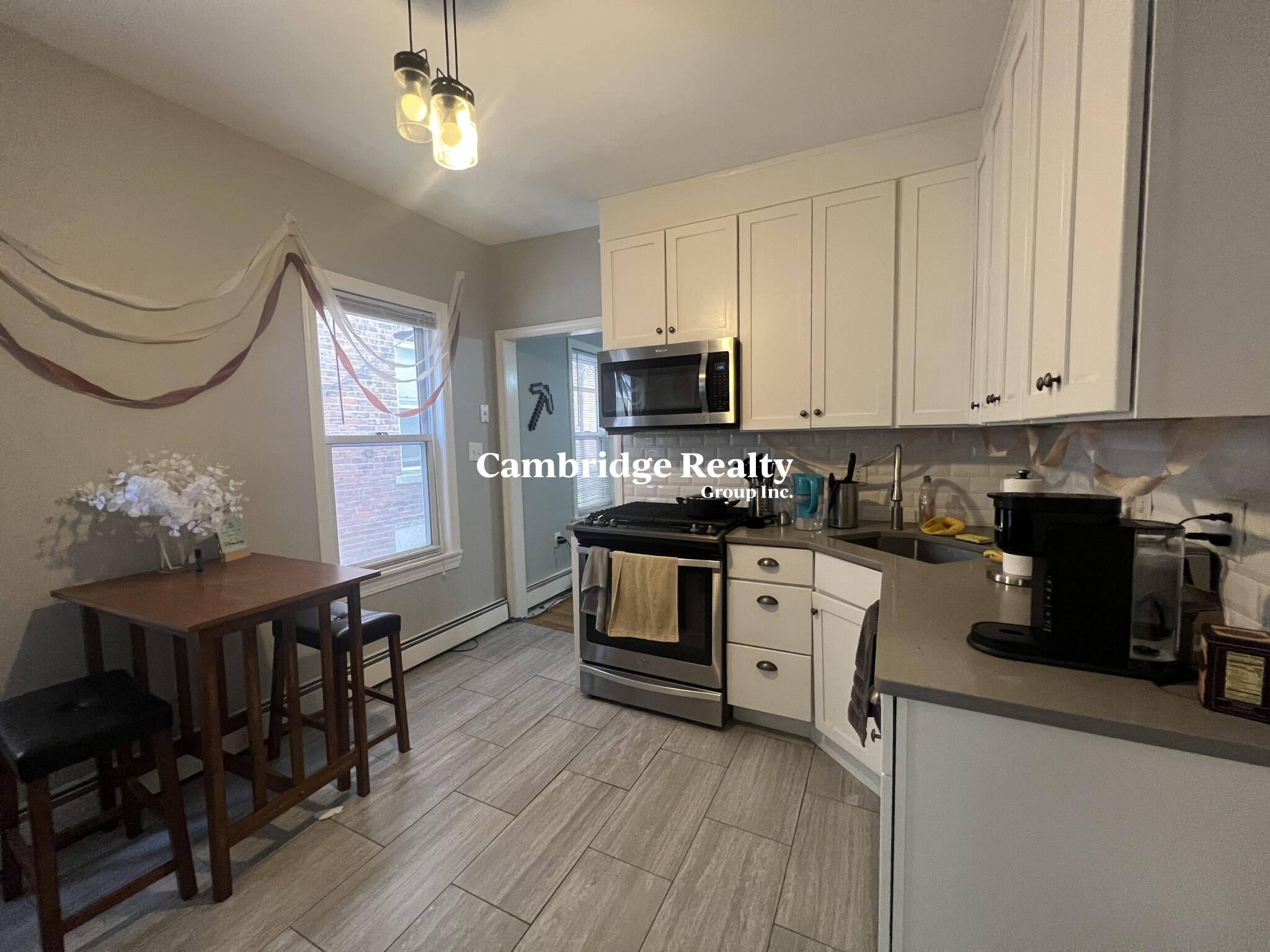 2 bed, 1 bath apartment for rent at 5 Marcella St Unit 1, Wellington-Harrington — photo 2 of 14