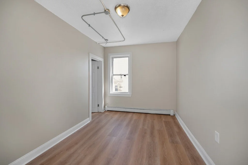 3 bed, 1 bath apartment for rent at 50 1/2 Common St Unit 8, Lawrence — photo 4 of 12