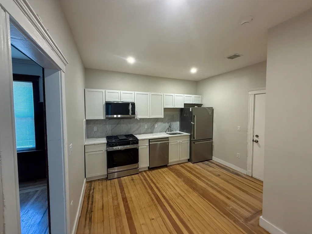 5 bed, 2 bath apartment for rent at 51 Pasadena Unit 2, Dorchester — photo 1 of 15