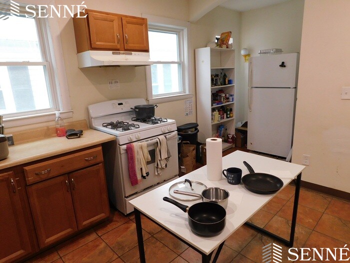 4.5 bed, 2 bath apartment for rent at 51 Porter Rd Unit 51, North Cambridge — photo 2 of 12