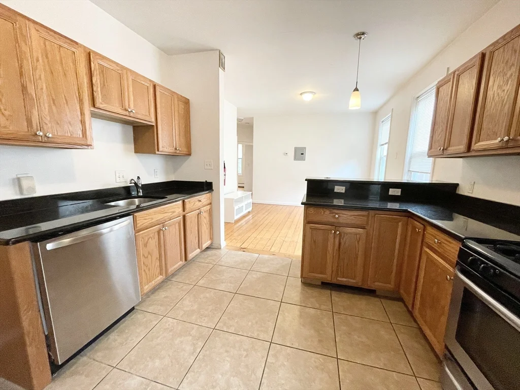 4 bed, 1 bath apartment for rent at 52 Delle Ave Unit 2, Mission Hill — photo 2 of 14