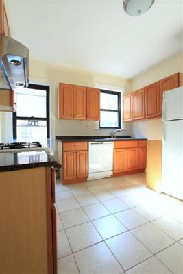 4 bed, 2 bath apartment for rent at 53 Bay State Ave Unit 1, Powder House Square — photo 3 of 23
