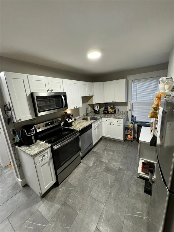 3 bed, 1 bath apartment for rent at 55 Collins St Unit 1, Lynn — photo 1 of 8