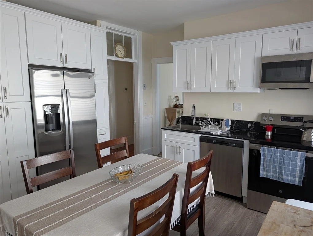 4 bed, 2 bath apartment for rent at 57 Dimick St Unit 3, Union Square — photo 1 of 4