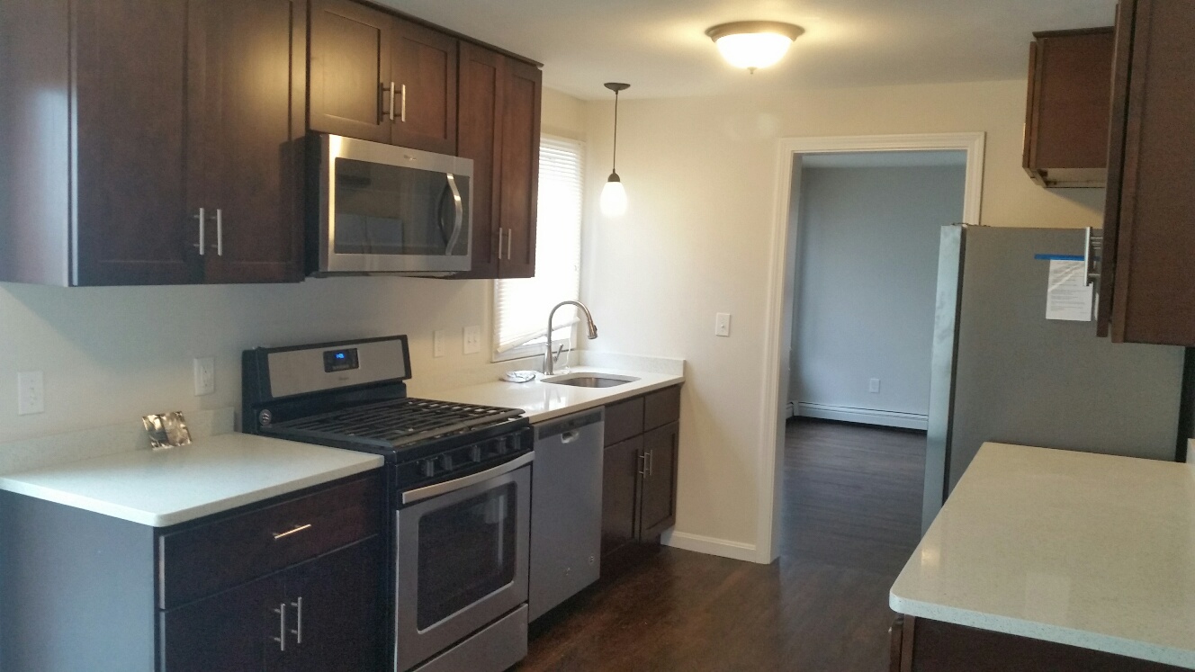 4 bed, 4+ bath apartment for rent at 57 Gerrish St Unit 2, Oak Square — photo 1 of 10