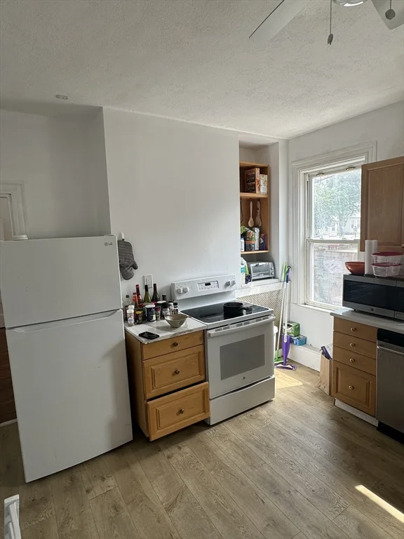 4 bed, 2 bath apartment for rent at 58 Aspinwall Ave Unit 1, Coolidge Corner — photo 1 of 20